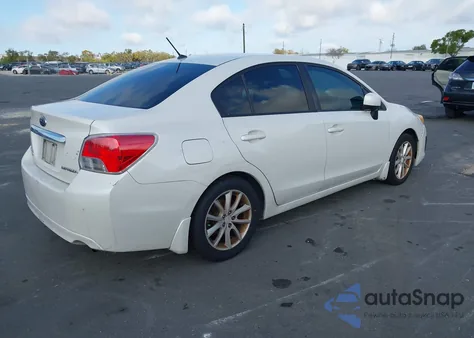 2012 Subaru Impreza 2.0I Premium z USA, uszkodzony, nr VIN JF1GJAB65CH006181